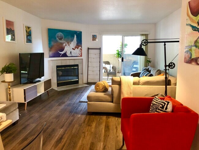 Relax and enjoy this comfy living room - 5915 Gloria Dr Unit 4