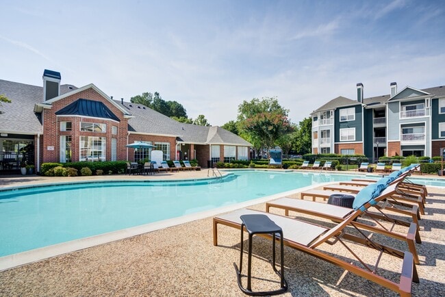 Relaxing Pool View with Lounge Chairs