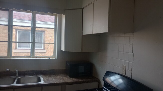 Building Photo - 9113 Lawler Ave Unit 2