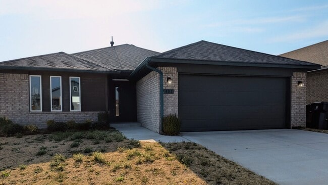 Photo - Spacious Yukon Home with Storm Shelter, 2-Car Garage & Fenced Yard!