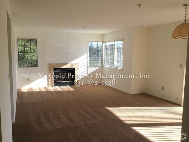 Building Photo - Spacious 2-Bed, 2-Bath Condo with Fireplac...