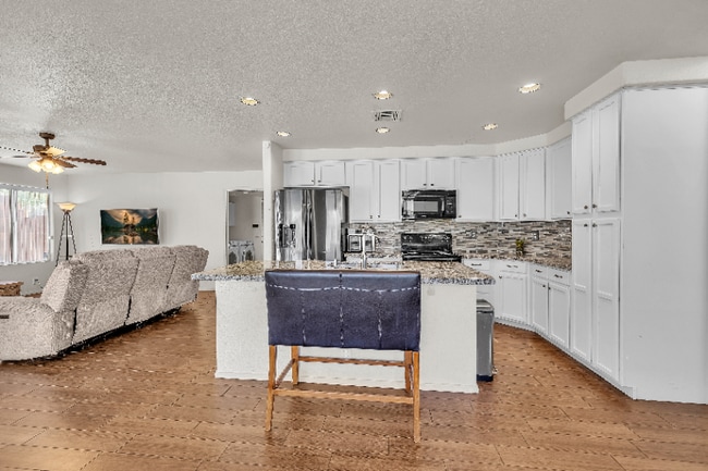 Photo - 6366 E Riverdale St