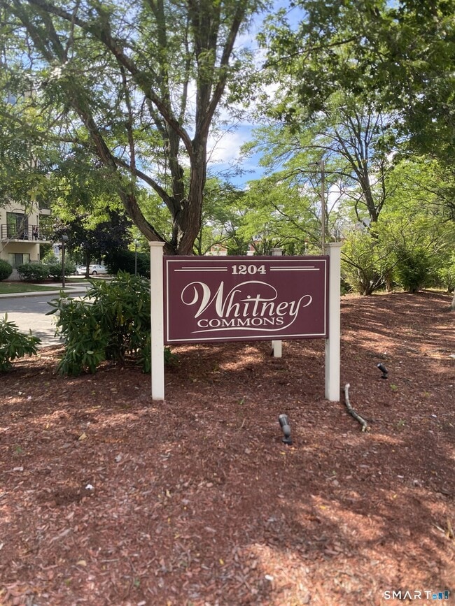 Building Photo - 1204 Whitney Ave Unit APT 203