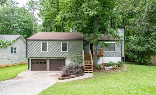Building Photo - 4 Bed/2 Bath w/ Huge Basement Minutes from... Rental