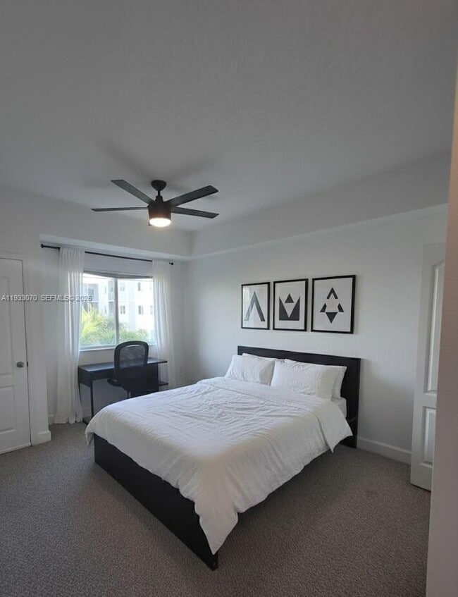 Building Photo - 6001 SW 70th St Unit 542