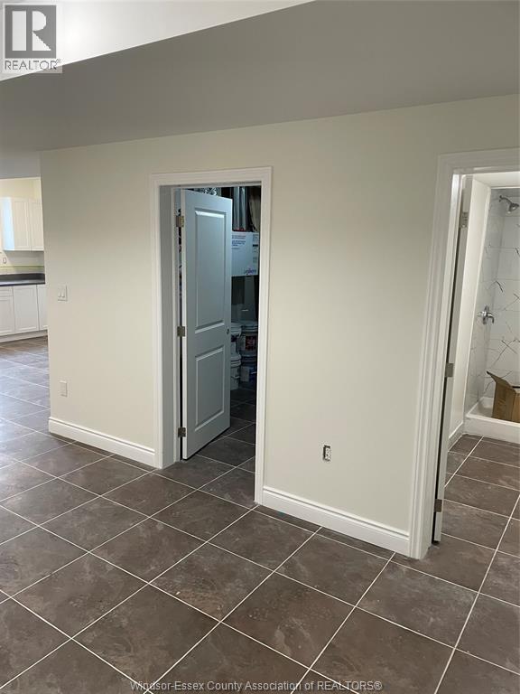 Photo - 720 Grand Marais Rd E