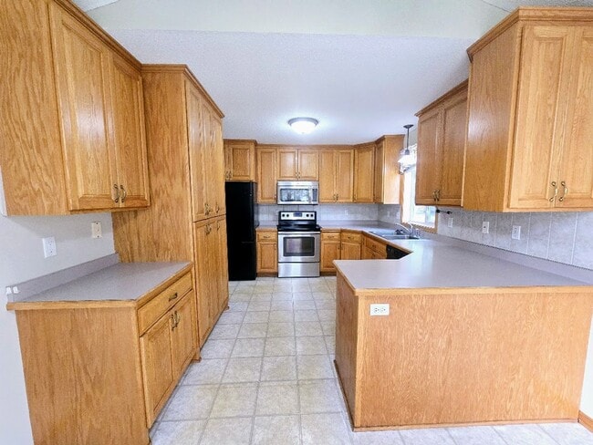 Photo - Charming 2-Bedroom, 2-Bathroom Home with Sunroom & Patio in Woodbury, MN