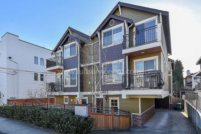 Building Photo - Spacious townhome with private backyard, garage parking, multiple decks, and a dedicated home off...