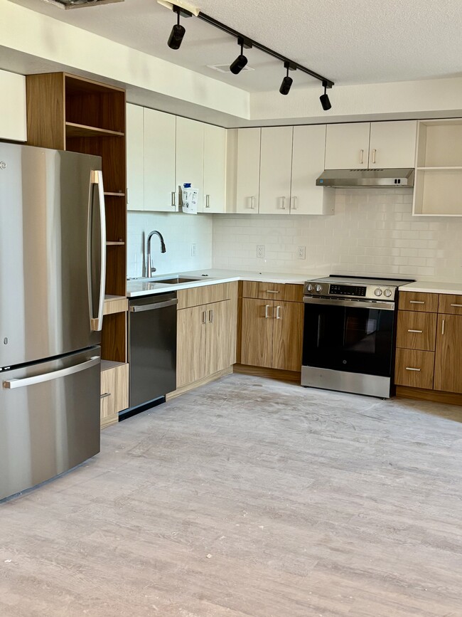 1 - bed Kitchen - The Irving at Mile High Vista