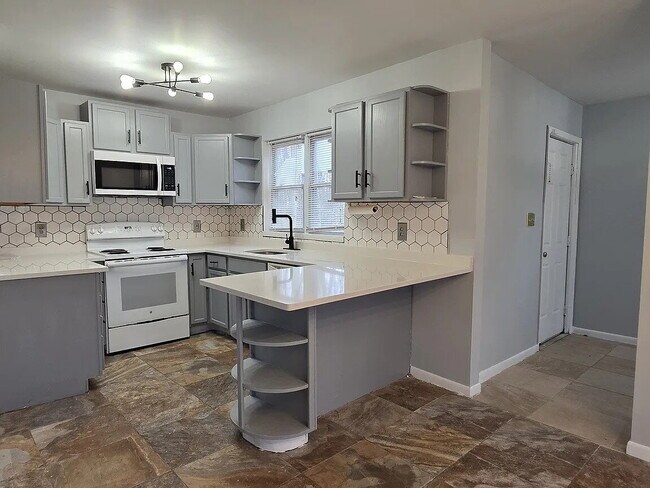 Photo - Spacious 4-bedroom, 2-bathroom contemporary home is available for rent