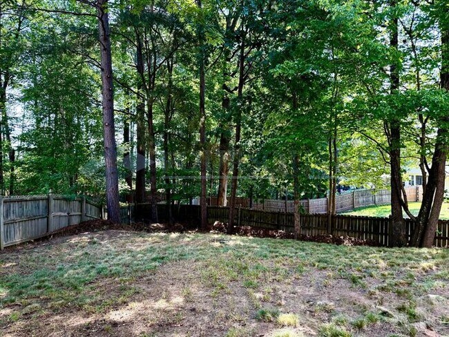 Photo - Spacious 3-Bed Home with Open Floor Plan, Fenced Backyard & 1-Car Garage – Apex Location
