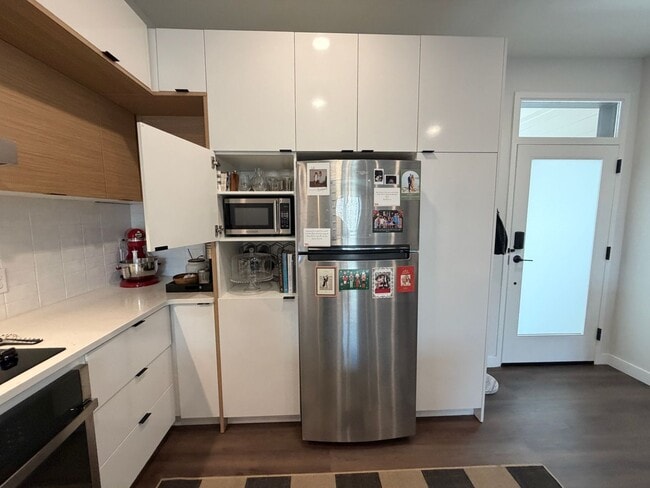 Photo - Top-Floor Corner Condo with Downtown Views — Stylish, Pristine, and Steps From Everything Unit 304