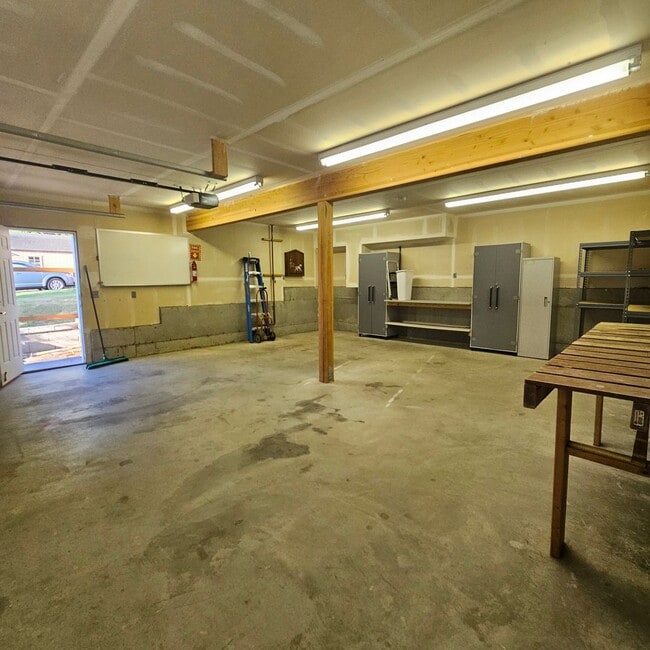 Photo - Charming 1-Bedroom Home with Spacious Backyard, 2 car garage & Modern Amenities – Pet Friendly!
