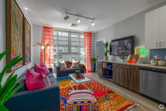 3BR, 2BA - 1,016SF - Living Room - Urbane