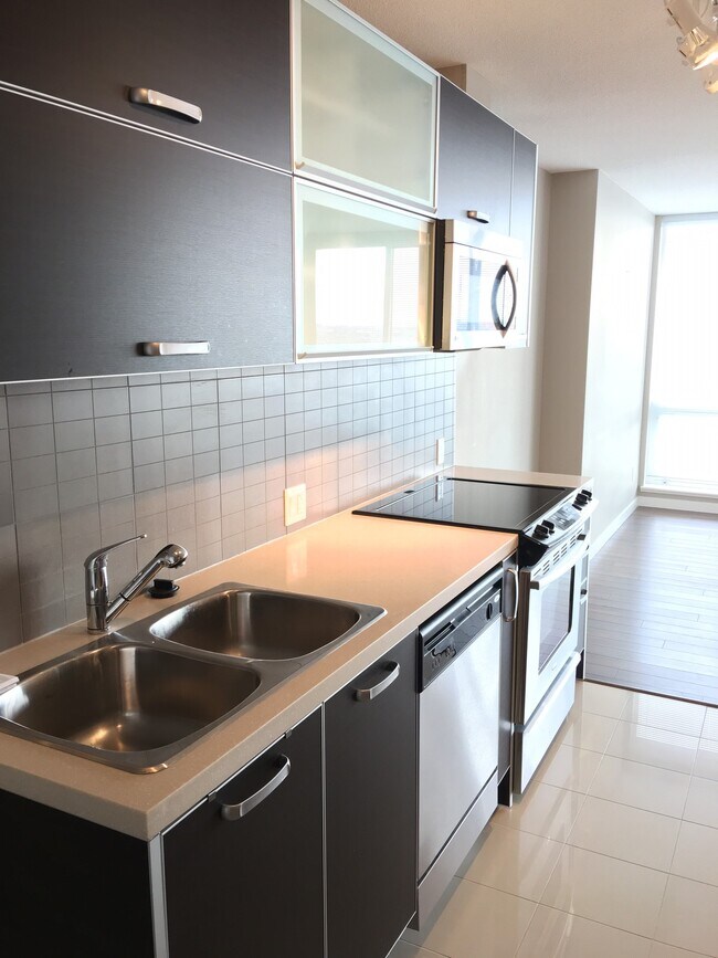 Photo - 9981 Whalley Blvd Unit 1205