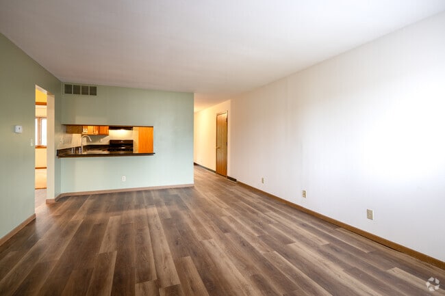 2BR, 1.5BA - 1,100SF - Executive Suite - Dining Room and Living Room