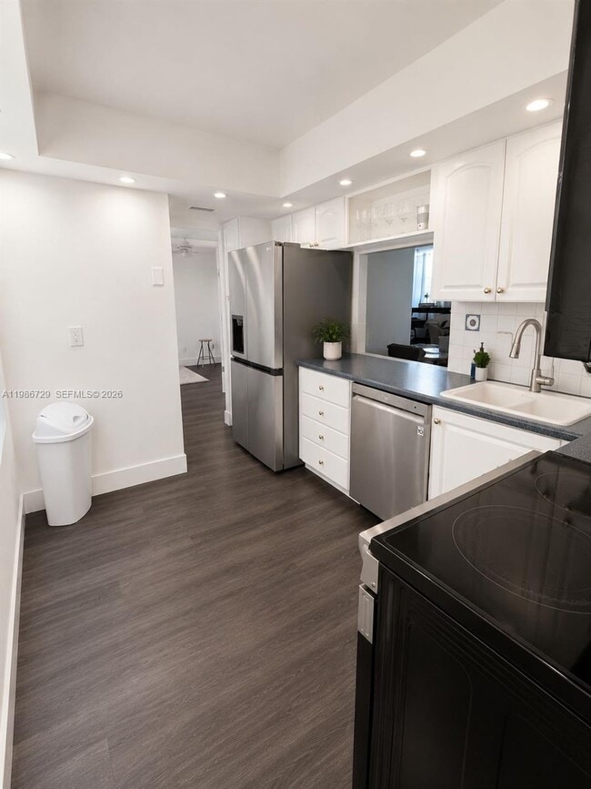Photo - 299 NW 52nd Terrace Unit PH-X