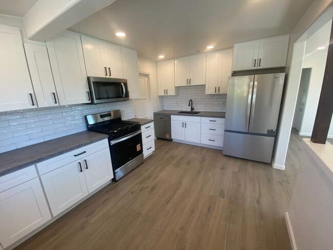 Building Photo - Completely Remodeled 2 Bed, 1 Bath with Garage and Large Yard!