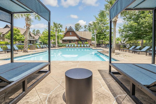 Relax by the resort-style pool at The Cottages of Hattiesburg, perfect for unwinding and enjoying student life.