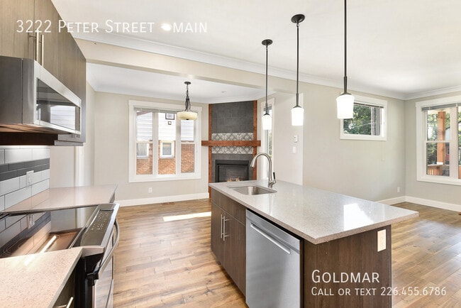 Photo - 2 bedroom Plus Den, 2 Bath with fireplace and high end appliances Unit main