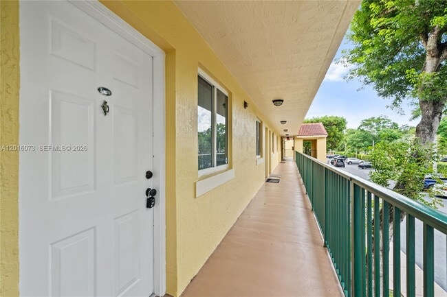 Building Photo - 12635 SW 91st St Unit 208