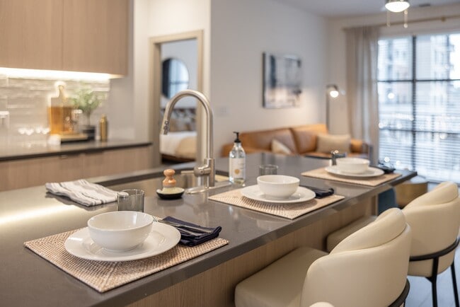 Stylish open-concept layout with kitchen island and inviting living space.