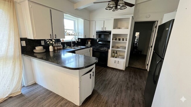 Photo - The Complete Package: 4BR with 2-Car Garage & Carport