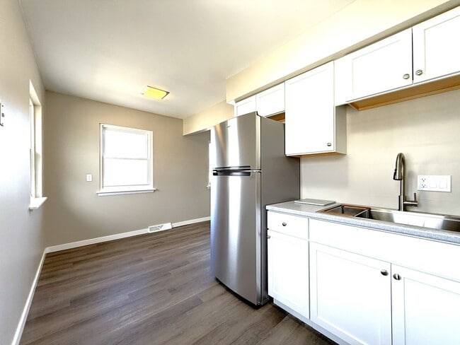 Building Photo - 11049 W Hampton Ave Unit #4