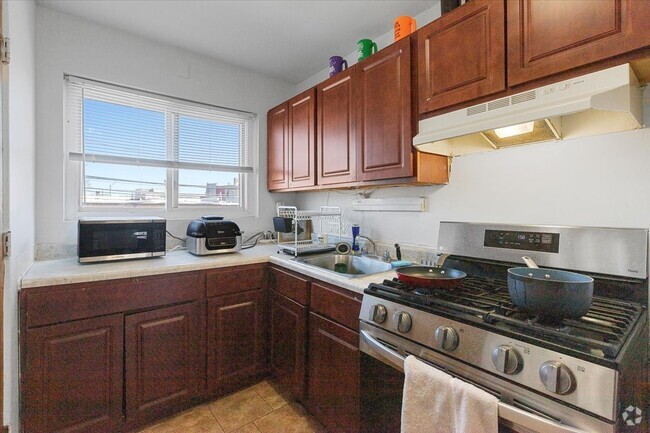 Building Photo - 6719 N Hermitage Ave Unit 3B Rental