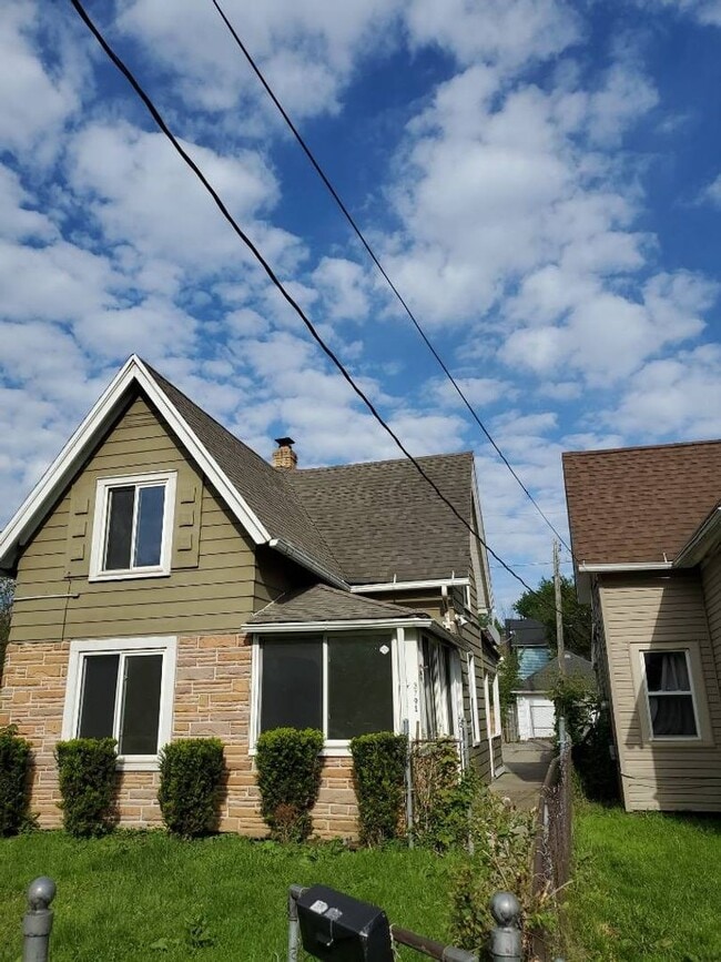 Photo - Newly Renovated 4BR/1BA Single-Family Home with Garage – Cleveland