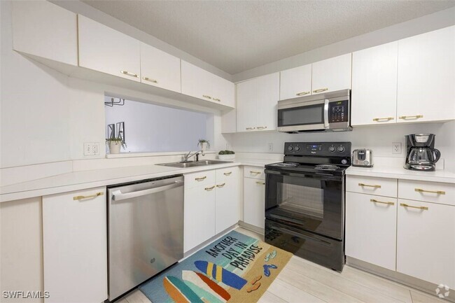 Building Photo - 7767 Jewel Ln Unit 203 Rental