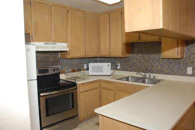 Building Photo - 6815 Remmet Ave Unit 209 Rental