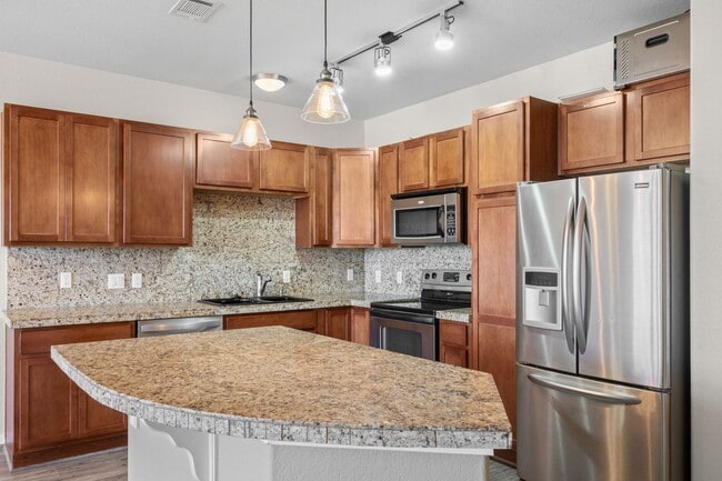 Building Photo - Charming 2 Bed, 2 Bath Top-Floor Condo with Great Sunrise Views