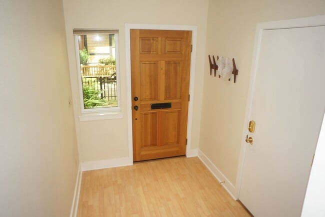 Photo - Beautiful 2 bedroom Belmont Condo. 3 Stories, 1 car garage, open floor plan, a/c. Amazing unit!