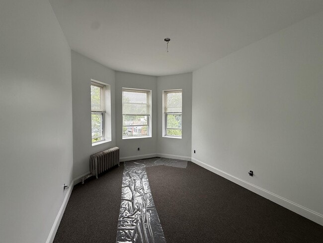 Building Photo - 70 Kirkland St Unit 35