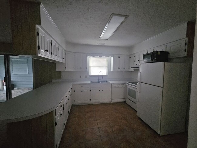 Photo - Two blocks from the beach!