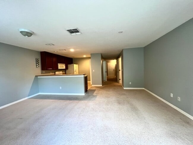 Photo - MOVE IN MARCH! Charming 2 Beds 2.5 Bath Townhome! 2 MASTER SUITES! Attached one car garage!! Extr...