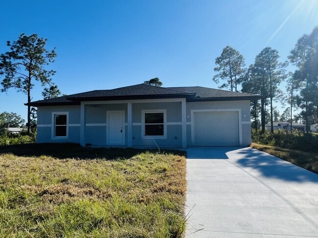 Building Photo - ONE OF A KIND! BRAND NEW 1 Bedroom-1 Bath- 1 Car Garage in Desirable Lehigh Acres!