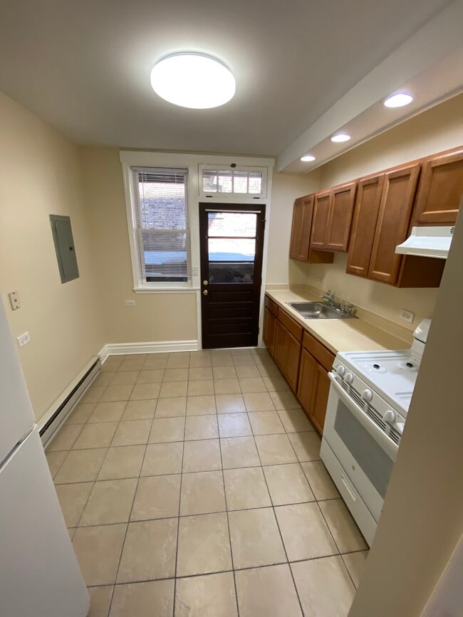 Building Photo - 6711 19th St Unit 5