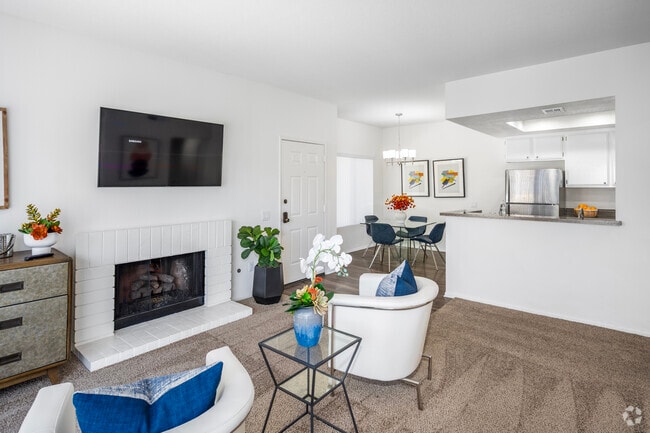 1BR, 1BA + Den - 900SF - Living Room and Dining Room