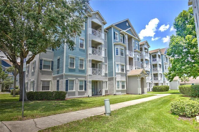 Building Photo - 5255 Cane Island Loop Unit 204