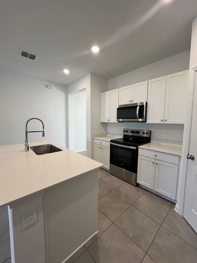 Photo - Town Home in The Trails -2 Primary Suites!!