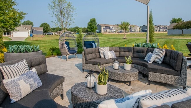 Experience leisure and unwind in our open-air Cloud Lounge, offering Wi-Fi, a serene fire pit, and plush seating.