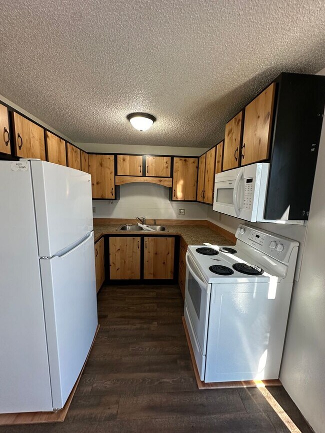 Photo - Modernly updated two bedroom, one and half bathroom townhome located within walking distance to R...