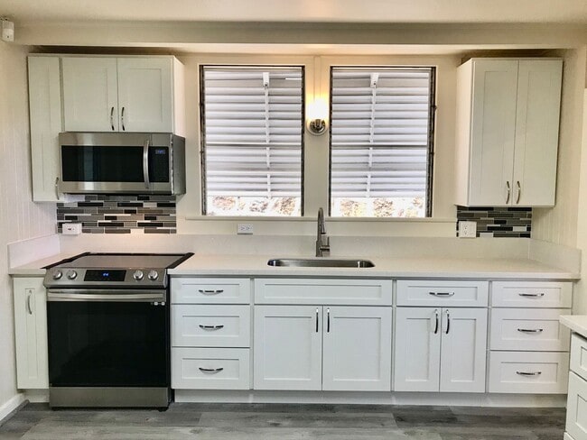 Photo - Punchbowl area Single family 3/1.5/1 car carport