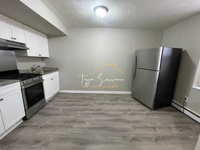 Building Photo - 65 Shawmut St Unit 2