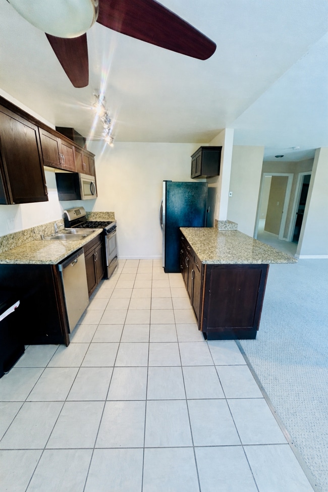 Building Photo - 13754 Mango Dr Unit 313