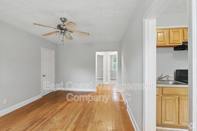 Building Photo - 5906 The Alameda Unit Apt 1