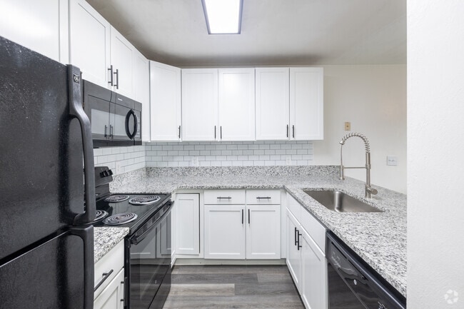 4BR, 2BA - 1,194SF - Kitchen - The Hills Northview Apartments (new)