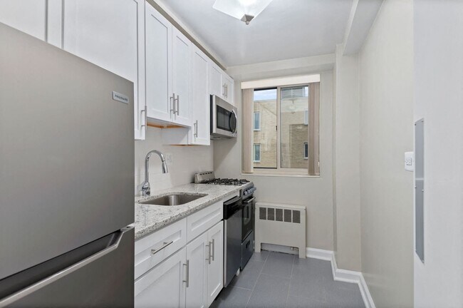 Renovated Kitchen with granite countertops and stainless steel appliances